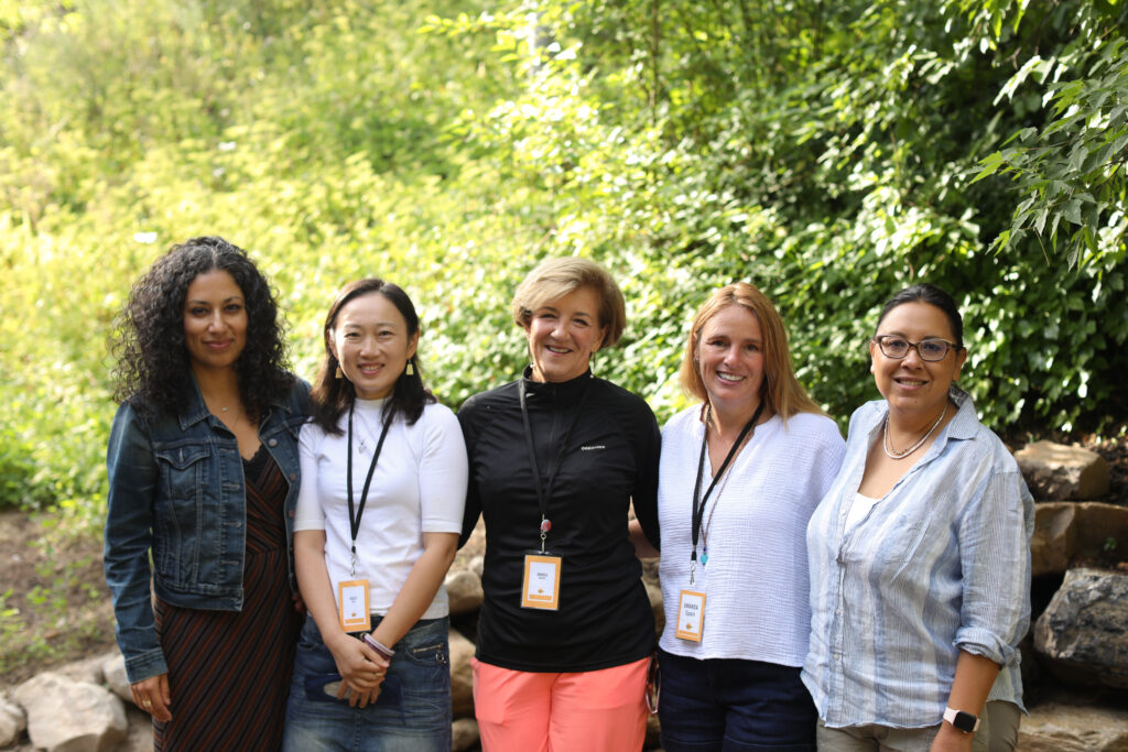A communal moment at the 2022 Creative Producing Lab. From left to right: Daffodil Altan, Violet Feng, Andrea Meditch, Amanda Spain, Carrie Lozano. (Photo by Maya Dehlin)