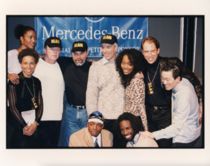 group of people smiling and posing at the camera