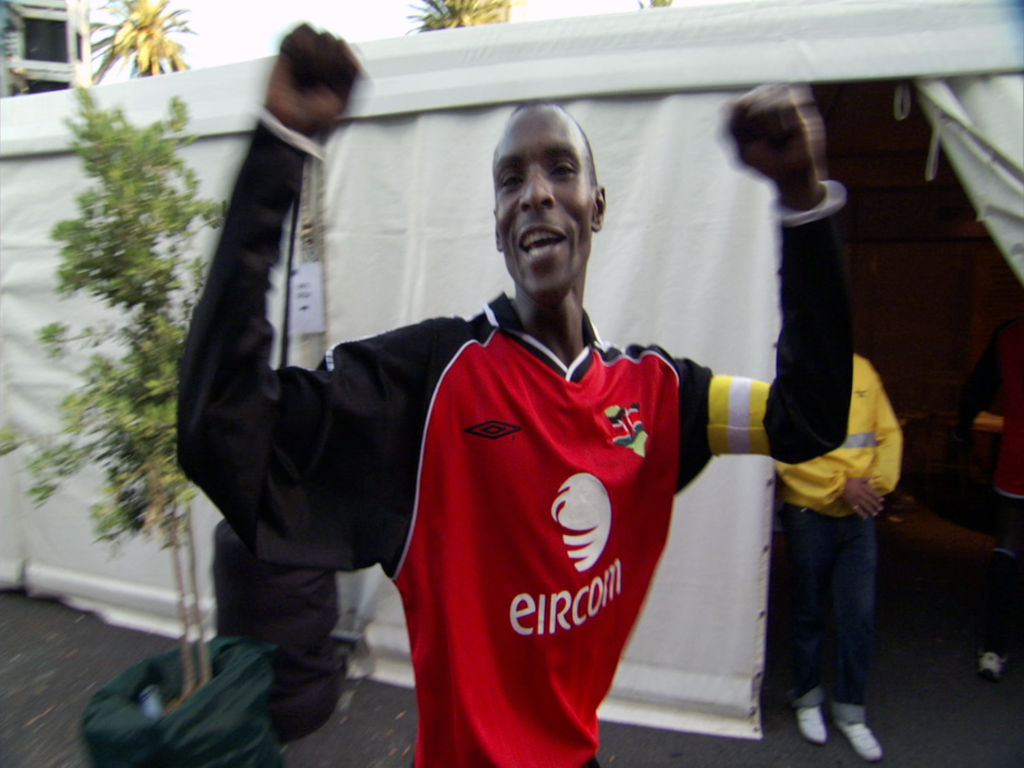 black man in a soccer jerse