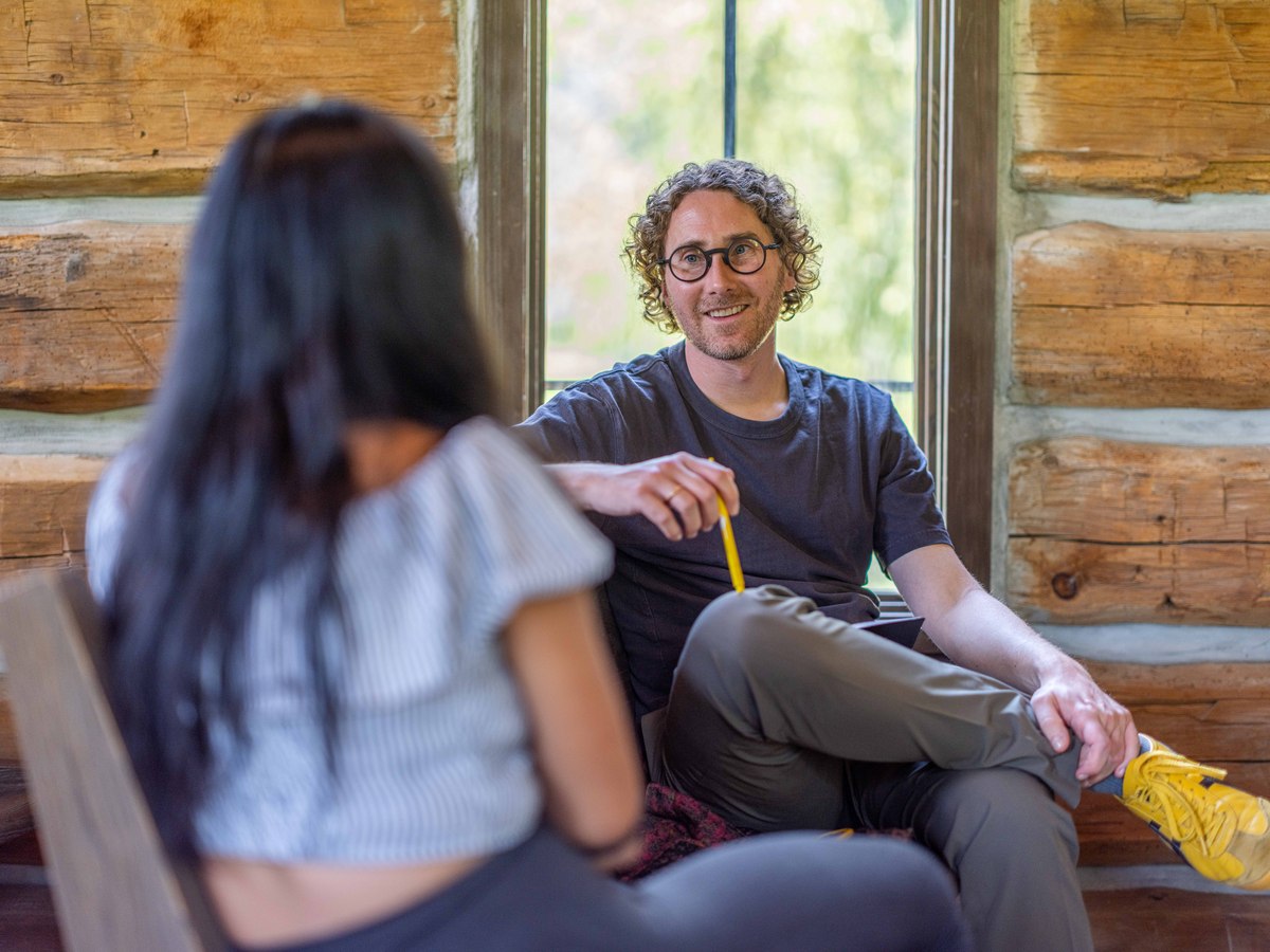 Creative advisor Rémi Grellety (right) meets with 'Becoming Us' fellow Loi Ameera Almeron during the 2025 Documentary Producers Lab. Photo by Lance Roth