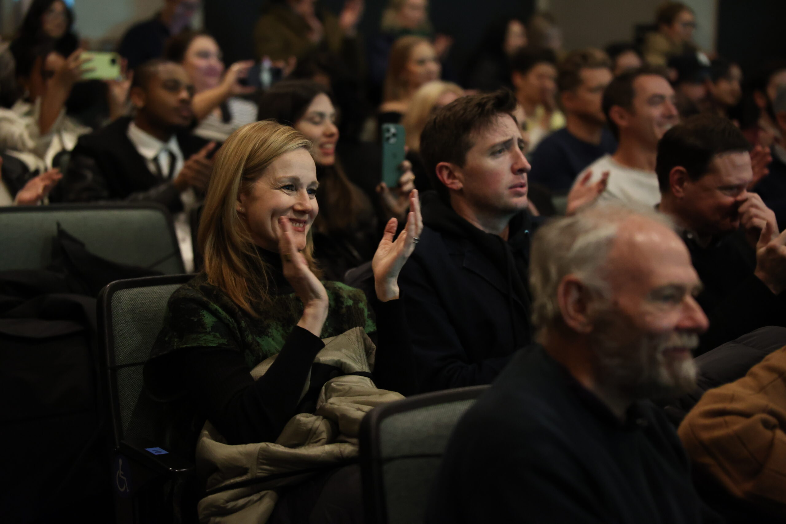 Actress Laura Linney applauding in a crowd during the Sundance Film Festival in Park City, Utah.