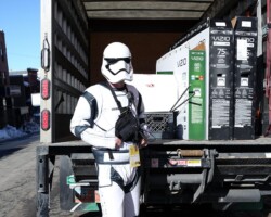 Our stormtrooper staffer aka Mark Tauscher helping unload a truck pre-Festival. Photographer: Azikiwe Aboagye