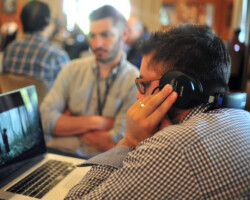 Creative advisor Tim Pastore watches a clip from 'Young Men and Fire.' Photographer: Jonathan Hickerson