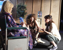 Director Hannah Utt speaks with Judith Light and Jen Tullock on set for 'Stupid Happy.' Photographer: Fred Hayes