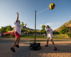 Guests at a free community screening of 'Napoleon Dynamite' play tetherball, as featured in the film. Photographer: Jonathan Hickerson