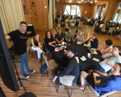 Creative advisor Jason Michael Berman presents to a group of fellows, advisors, and staff in a breakout session. Photographer: Fred Hayes
