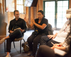 Producing fellow Razelle Benally contributes to a small group breakout session of advisors, fellows, and staff. Photographer: Jen Fairchild