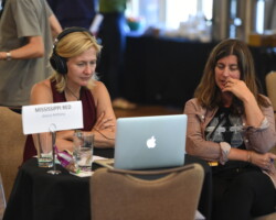 Producing fellow Jessica Anthony (right) presents her documentary 'Mississippi Red' to creative advisor Annie Roney. Photographer: Fred Hayes