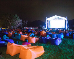 Guests attend a special screening of 'Swiss Army Man' at a Film Screening Under the Stars. Photographer: Ko Wing Kin