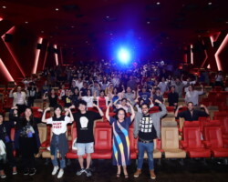 Audience members at the 'Blindspotting' screening pose with director Carlos Lopez Estrada. Photographer: Ko Wing Kin