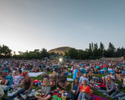 Guests line the hillside far and wide to secure a spot for the Summer Film Series screening of 'Believer' at the Red Butte Garden Amphitheatre. Photographer: Jonathan Hickerson