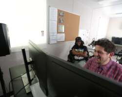 Editor Taylor Levy (right) works in the editing bay with director A.V. Rockwell on her project 'A Thousand and One Nights.' Photographer: Dan Campbell