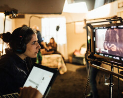 Directing fellow Barbara Cigarroa behind the scenes of her project 'El Otro Lado (The Other Side).' Photographer: Jen Fairchild