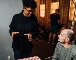'Pretty Red Dress' Director Dionne Edwards works on set with actor and volunteer Shawn Stuart. Photographer: Jen Fairchild