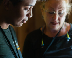 Directing fellow Dionne Edwards and script supervisor Margery Kimbrough work on 'Pretty Red Dress.' Photographer: Jonathan Hickerson