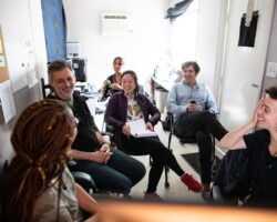 'Through the Night' director Loira Limbal and editor Malika Zouhali-Worrall (right) participate in a feedback section with creative advisors Lou Pepe, Nanfu Wang, and Alex O'Flinn and contributing editor M'Daya Meliani (back). Photographer: Jen Fairchild