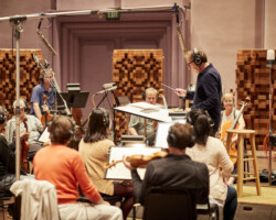 Peter Golub, Director of the Sundance Institute Film Music Program, conducts the orchestra at the 2019 Music and Sound Design Lab at Skywalker Sound. Photographer: Rob Williamson