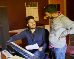 Composing fellow Jorge Aragón Brito and director Andres Farías discuss 'Candela.' Photographer: Rob Williamson