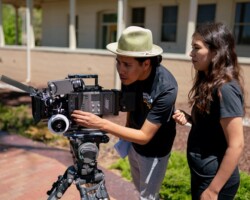 Creative Advisor Shaandiin Tome works with fellow Kyle Bell on set of his project 'Spirits'. Photographer: Austin Madrid