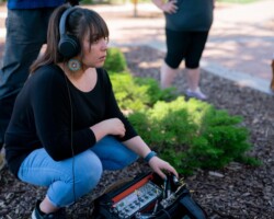 Crew member Charine Gonzalez on the set at the 2019 Native Filmmakers Lab. Photographer: Austin Madrid