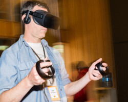 Creative Advisor Jon Raymond checks out a Virtual Reality experience at the 2019 New Frontier Story Lab. Photographer: Jonathan Hickerson