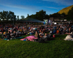 Guests watch a free screening of 'Get Out' at the Red Butte Garden Amphitheater. Photographer: Lauren Wester