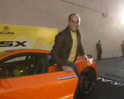 A guest interacts with the Acura NSX display at the 2019 'The Farewell' benefit. Photographer: Aaron Farley