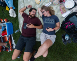Guests relax before a community screening of 'Summer of Soul' at Red Butte Garden Amphitheater. Photographer: Jonathan Hickerson
