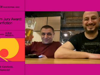 Ermegan Kazazi and Samir Karahoda share a toast and accept the Short Film Jury Award: Nonfiction Presented by XRM Media for 'Displaced.' Photographer: Displaced