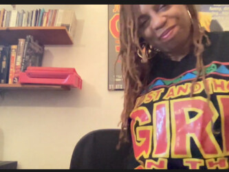 Director Leslie Harris shows off her 'Just Another Girl on the I.R.T.' t-shirt during the Q&A following the virtual premiere of the newly restored film. Photographer: Sundance