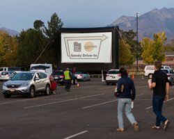 Attendees arrive for a free community screening of 'Giving Voice' presented in conjunction with Utah Film Center in Sandy, UT. Photographer: Jonathan Hickerson