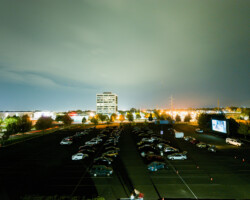 An overlook view of the free drive-in screening of 'Save Yourselves!' presented in conjunction with Utah Film Center in Sandy, UT. Photographer: Jonathan Hickerson