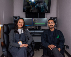 Editor Susan E. Kim (left) and lab fellow Neo Sora (right) in the editing room. Photographer: Jonathan Hickerson Susan and Neo sit beside each other, facing the camera