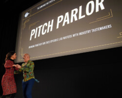 Lab fellow Ricardo Pérez González (right) and Episodic Program Director Jandiz Estrada Cardoso (left) share their excitement at Pitch Parlor 2023 in Los Angeles, CA. Photographer: Oscar Moreno