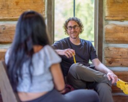 Creative advisor Rémi Grellety (right) meets with 'Becoming Us' fellow Loi Ameera Almeron during the 2025 Documentary Producers Lab. Photo by Lance Roth