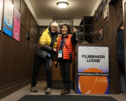 Volunteers ready to greet Festivalgoers at the Filmmaker Lodge. Photographer: Sam Emenogu