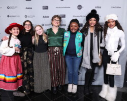 Director Alysa Nahmias (center) and the film subjects pose on the press line for the 'Cookie Queens' premiere at the Salt Lake City Celebration. Photographer: Breanna Down