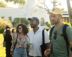 2025 Building Bridges fellows Aya Hamdan, Yusuf Ahmed, and Mustafa Eck during a reception at the Shangri La Museum of Islamic Art, Culture & Design. Photographer: Elyse Butler
