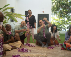 Fellows Tarek Albaba and Mustafa Eck make leis alongside staff and other 2025 Building Bridges Artist Retreat participants. Photographer: Elyse Butler