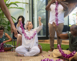 Fellow Sahar Jahani makes a lei alongside staff and other 2025 Building Bridges Artist Retreat participants. Photographer: Elyse Butler