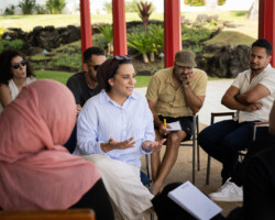 Fellows Aya Hamdan, Mustafa Eck, Sahar Jahani, Tarek Albaba and Omar Al Dakheel during a group discussion at the 2025 Building Bridges Artist Retreat. Photographer: Elyse Butler
