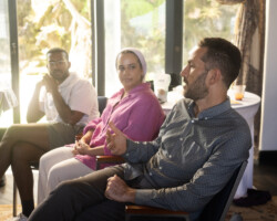 2025 Building Bridges fellows Yusuf Ahmed, Sahar Jahani, and Mustafa Eck during a group discussion. Photographer: Elyse Butler