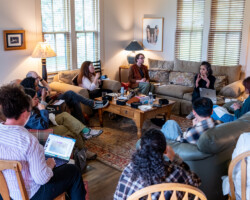 Fellows and creative advisors take notes during a presentation by advisor Gema Juárez Allen. Photographer: Jenae Neeson